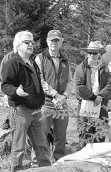 Joe Pizarchik, left, director of the U.S. Department of the Interior’s Office of Surface Mining, explains the importance of partnerships in restoration as Clyde Thompson, forest supervisor of the Monongahela National Forest, middle, and Jack Tribble, Greenbrier District Ranger, right, listen in.